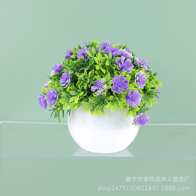 リラックスグッズ 丸みポットの小さな造花アレンジ