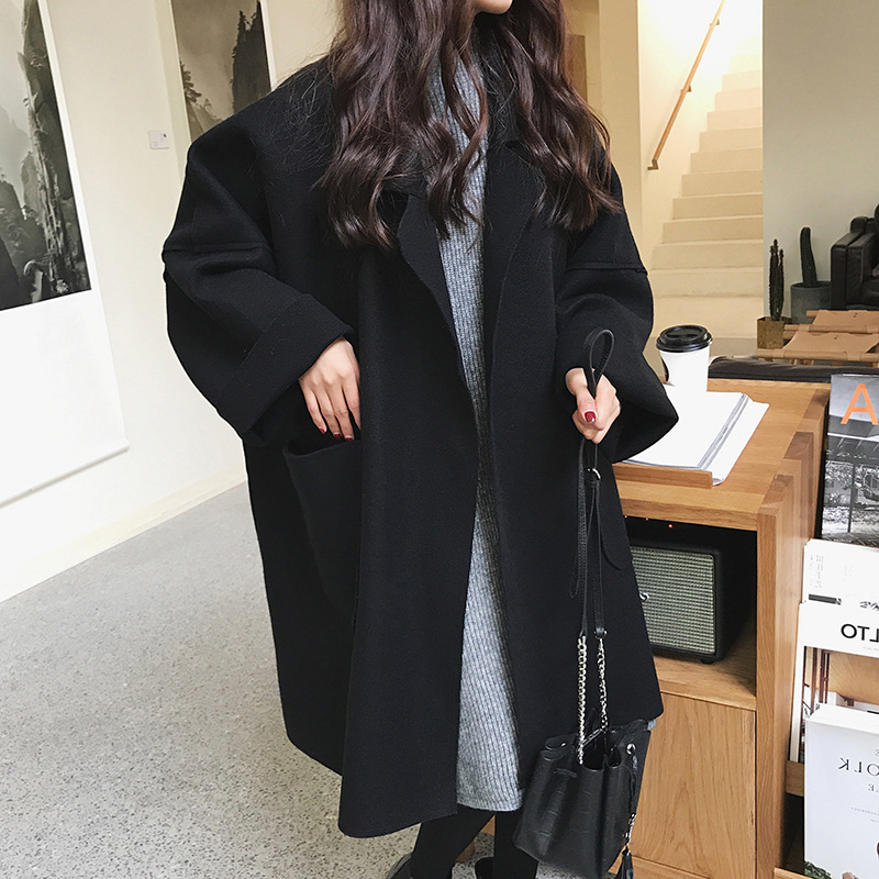 ゆったりシルエットの体型カバーコート